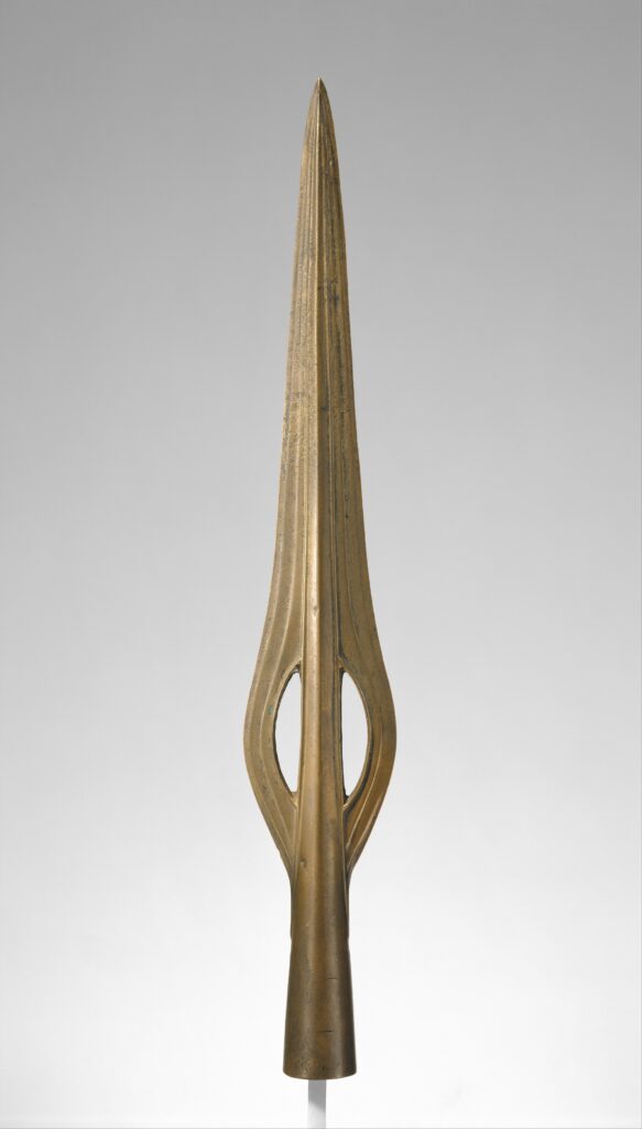 a 39.5 cm long socketed spearhead with two crescent-shaped holes in the wide parts of its head